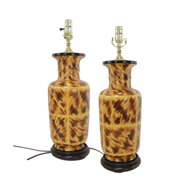 A pair of early 21st-century hand-painted tortoiseshell-patterned art ceramic table lamps These are a pair of vintage-...