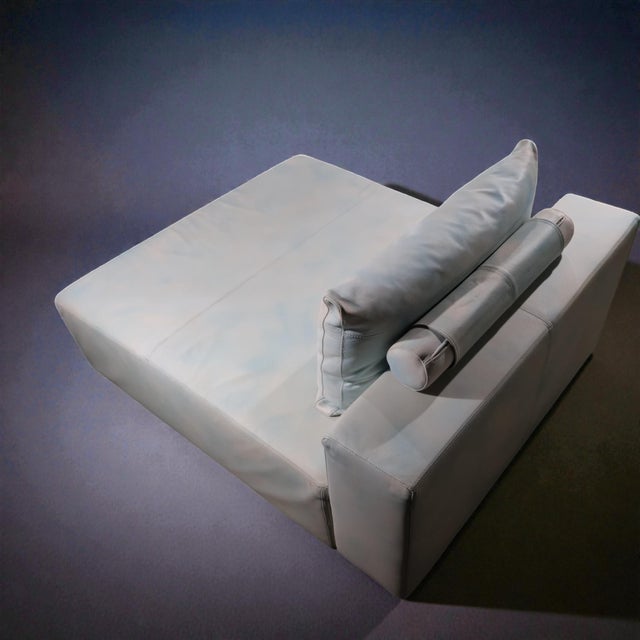 A sculptural leather lounge platform designed for relaxed, modern living. This piece redefines traditional seating by...