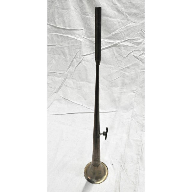 This is a slender copper Horn from an antique Model A car. It includes the mounting bracket. The piece has a beautiful...