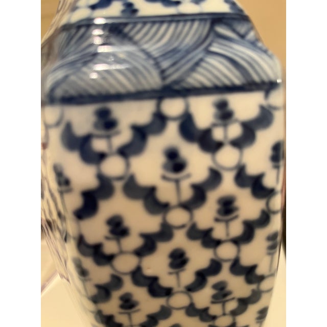 A clean fresh blue & white floral vase p. Useful size, intricate details, excellent condition, interesting hexagonal...