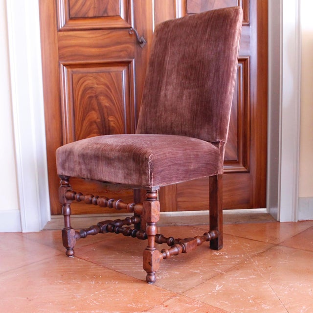 A handsome assembled set of six dining chairs, Italian or French, comprised of four matching chairs along with a matched...