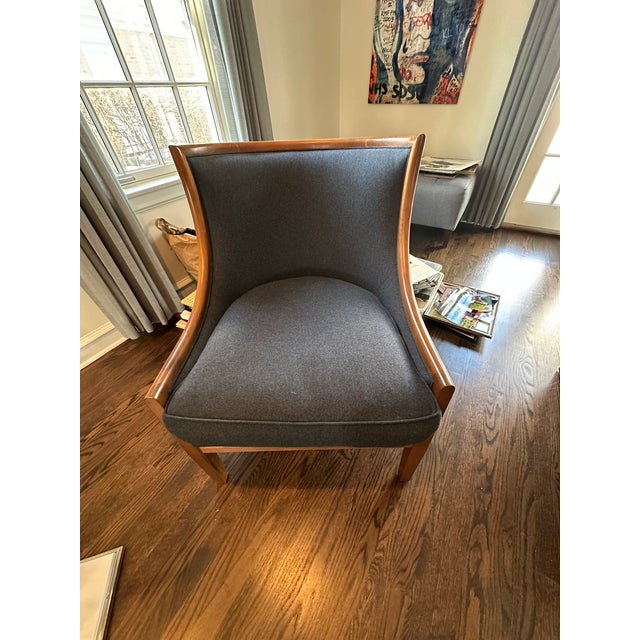 Michael Berman Limited Armchair — Sculptural Wood Frame & Custom Upholstery Description: This elegant armchair by Michael...