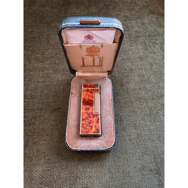 Rare Vintage Dunhill Gold Plated Light Cognac Marble Lacquer Lighter Original Sky Case In a Super Mint Condition. Circa...