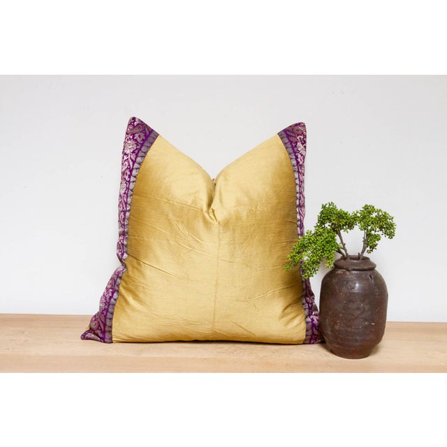 This brilliant silk euro pillow is a luxurious addition to any living room. Made out of silk with intricate borders of...