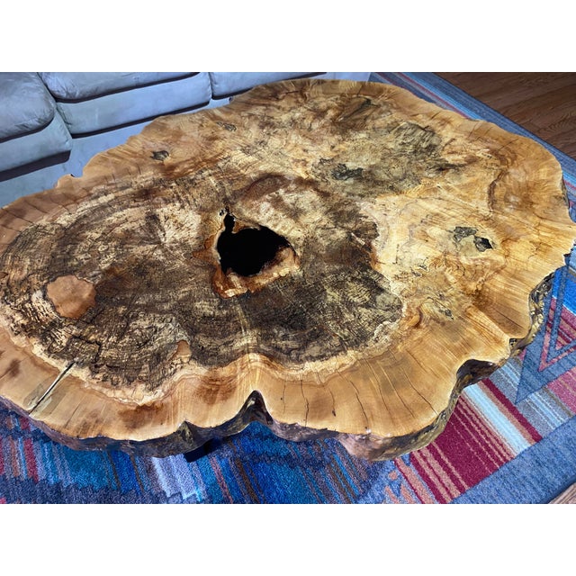 My dad is a woodworker and finished this table a few months ago. He was curious is anyone was interested in it.