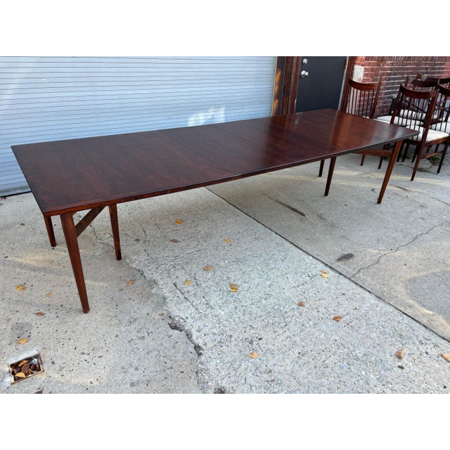 Arne Vodder for Sibast Brazilian Rosewood Expansion Dining Table. 78.5 closed, can open to 98.25 with one added leaf, or...