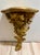 Palladio hand carved gilded wood decorative wall shelf. Neoclassic design with leaves, branches, and other foliage. Great...