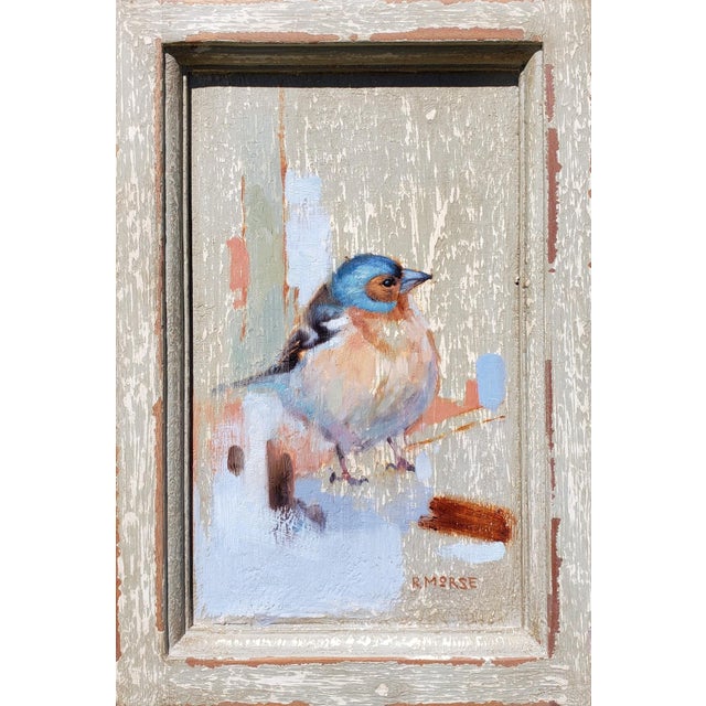 This oil painting presents a detailed depiction of a bird, capturing its vibrant plumage against a textured, antiqued...