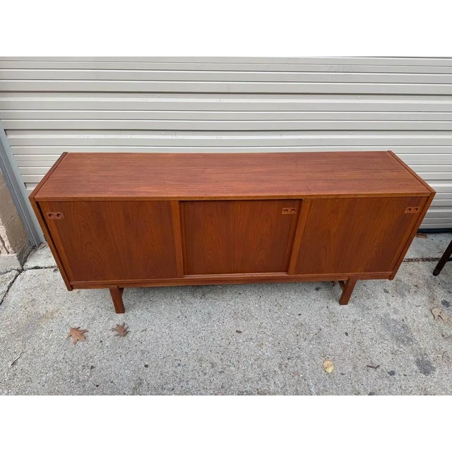 Mid Century Danish Koford Larsen Teak Sliding Door Sideboard-Credenza. 1970s. Well made, sturdy and strong Great condition...