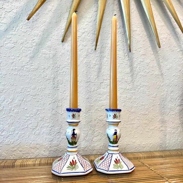 Pair of HB Henriot Quimper hand-painted faience candlestick holders from Brittany, France, circa 1986. Classic Breton man...