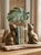 A striking and exceptionally substantial pair of vintage solid brass sitting cat sculptures. Reaching nearly 9 inches in...