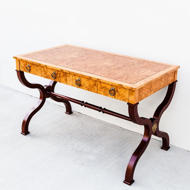 Expertly refinished neoclassical style writing desk or library table by Baker, made in the USA c. 1980s. This is the...