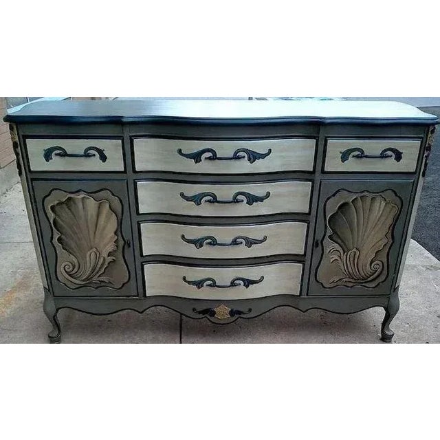 Fabulous pair of tea tables with exquisite hand painted French style decoration with shells and more in a blue/grey and...