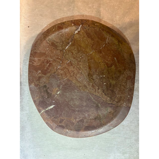 Beautiful heavy stone marble platter (6.8lb) Asymmetrical oval shaped with raised flat edges. Indicative of a...