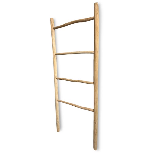 Natural wood stick ladder finished with clear sealer. Lightweight and each is unique in natural shape, coloring, and...
