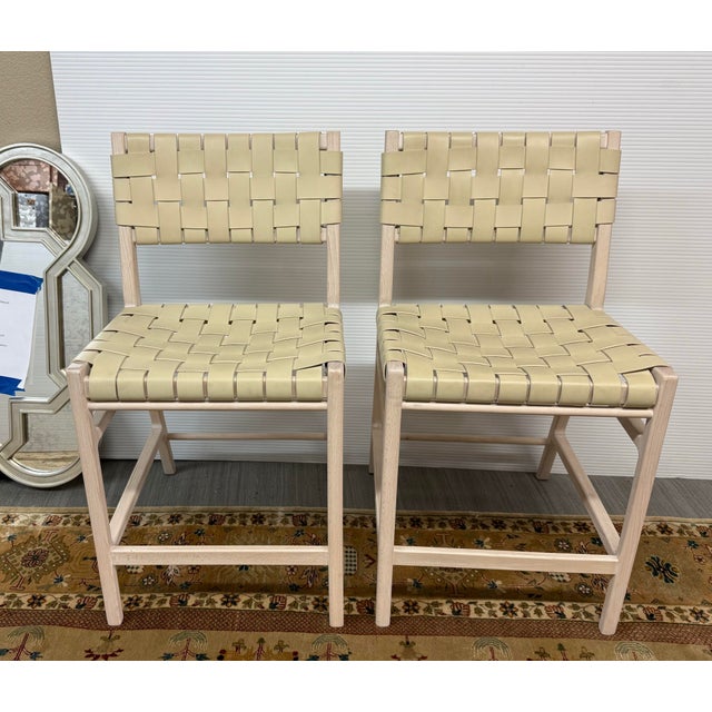 Design Plus Gallery presents the Stratton Counter Stools from Williams Sonoma. The classic woven-strap chair pairs...