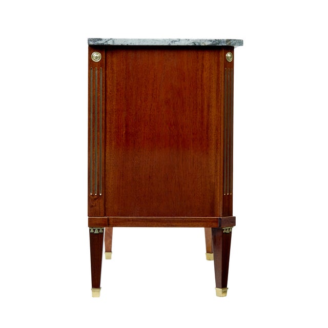 Early 20th Century Directoire Revival Marble Top Chest Of Drawers Circa 1920. We are pleased to offer this 1920's commode...