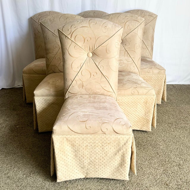 Add timeless elegance to your dining space with this set of six Regency-style skirted dining chairs. Upholstered in a...