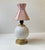 Romantic Danish table lamp made from an opaline glass sphere with brass accents and a hand-made pink textile shade with...
