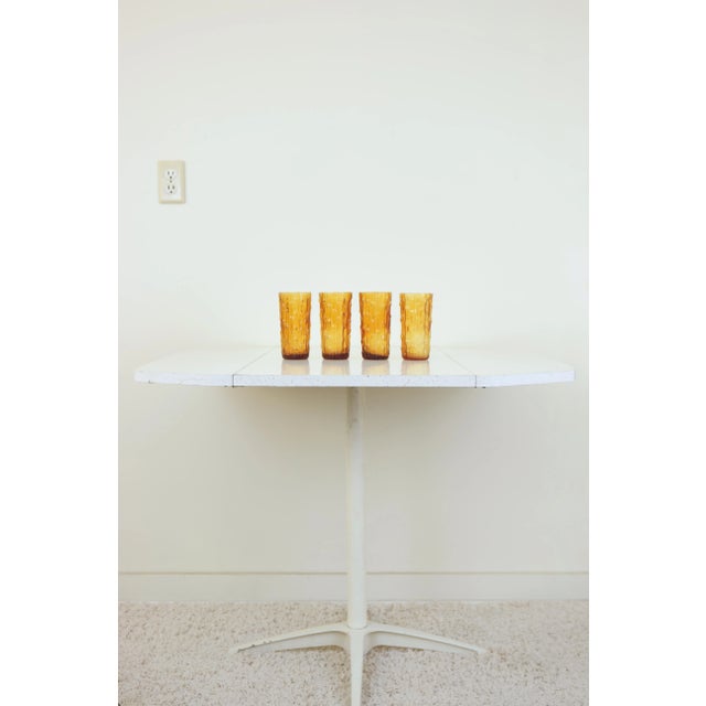 This vintage set of textured drinking glasses are every bit stylish as they are functional. Made of heavy duty high...
