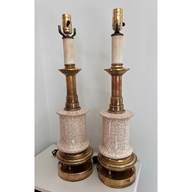 This pair of mid-century beauties feature stunning cream-colored crackle glazed ceramic bodies accented with deep russet-...