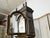 An English George III period Chinoiserie parcel gilt and japanned tall case clock from the 18th century, with black paint...