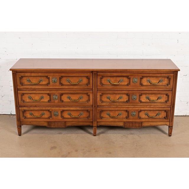 A gorgeous French Regency Louis XV style six-drawer long dresser or credenza By Henredon USA, Circa 1960s Carved...