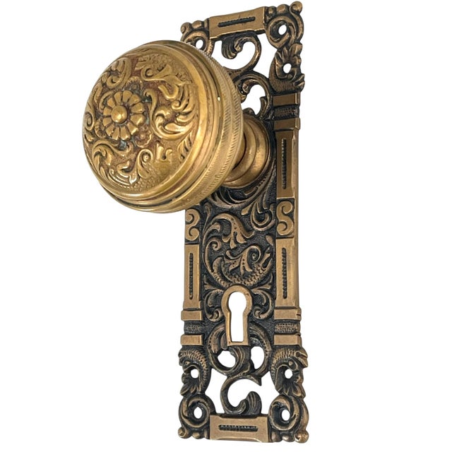 Add an eccentric touch to your decor scheme with this rare pair of American cast bronze door knobs with plate manufactured...