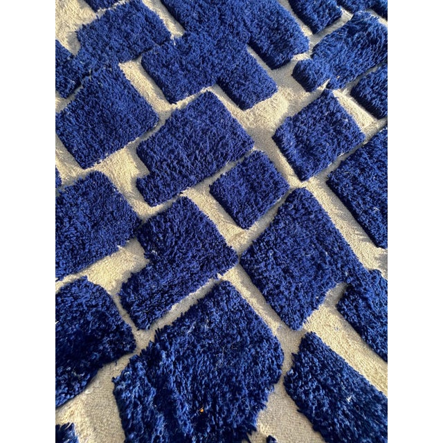 Bring a touch of Morocco’s timeless beauty into your home with this stunning handmade Moroccan rug in Majorelle Blue. This...