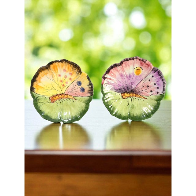 This product is a pair of Italian majolica hand painted luncheon dessert plates featuring a butterfly pattern. Made of...