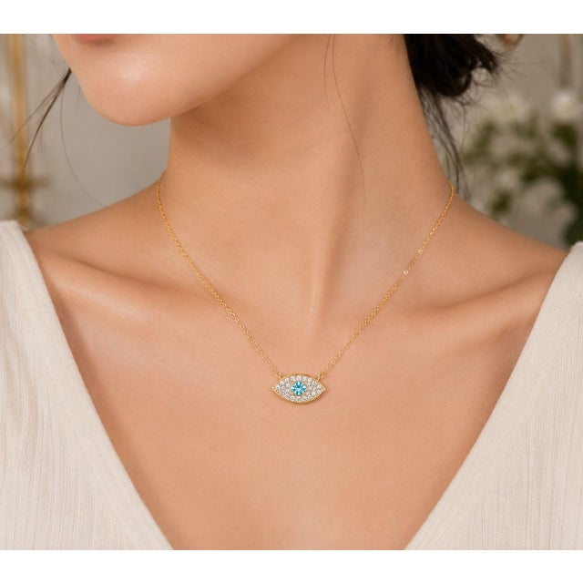 Gorgeous 14K Yellow Gold Blue Topaz Diamond Evil Eye Necklace. Metal: 14K Yellow Gold Center Stone: Natural Blue Topaz -...
