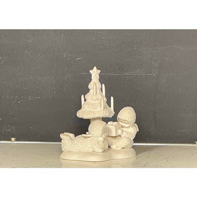 Vintage Department 56 Snowbabies "Thank You" figurine, specifically model #68857, which features two snowbabies with a...