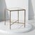 Introducing the Jessa forged metal square end table in brass, a captivating blend of style and functionality. This...