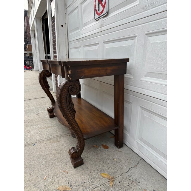 Vintage Neoclassical Revival Console Table With Ornately Carved Scroll Supports and Lower Shelf For Sale - Image 4 of 12