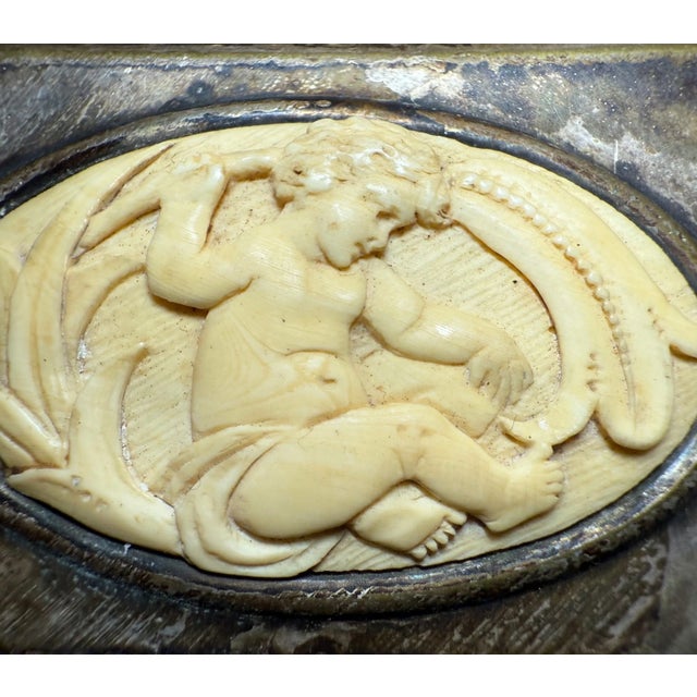 The antique WMF silverplate cigarette box from 1928 is a luxurious and elegant piece of decor. Dating back to the first...