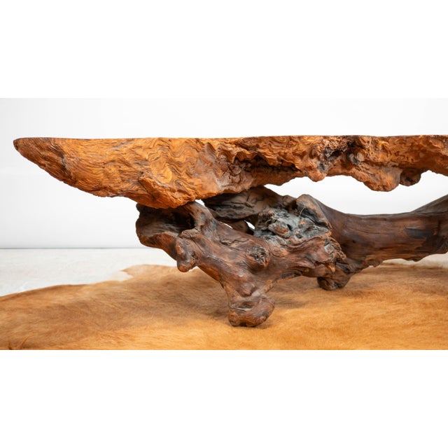Vintage American live-edge burl wood coffee table, circa 1970s. Primitive and rustic aesthetic with lots of woodgrain...