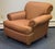 Beautiful Ethan Allen upholstered armchair featuring a classic, timeless silhouette with generously rolled arms, a plush...