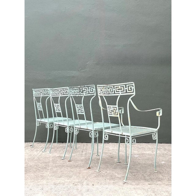 Exemplifying the timeless appeal of classic American garden furniture, this set of four vintage Meadowcraft outdoor dining...