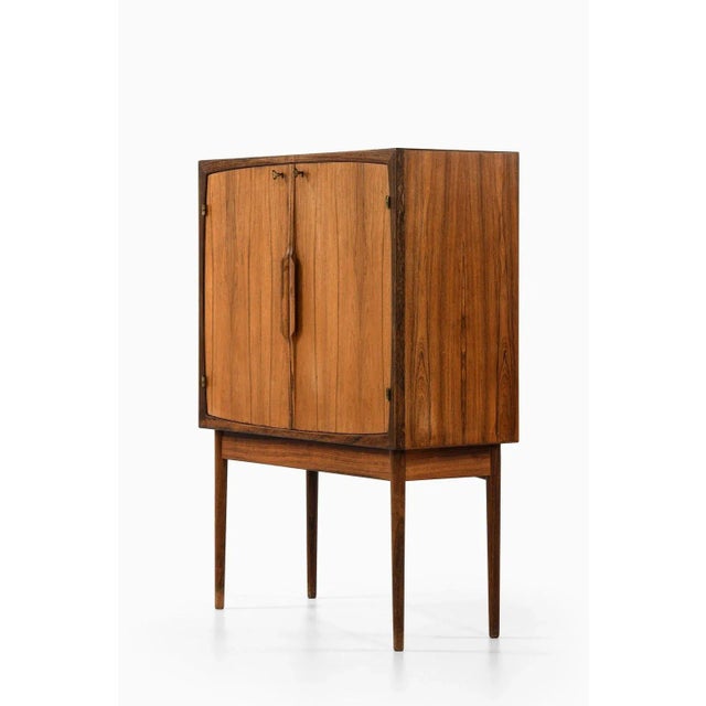 Bar cabinet in rosewood, glass and steel by torbjørn afdal, 1960's additional information: material: rosewood, glass and...