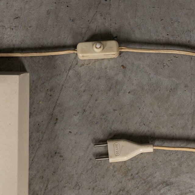 A striking two-leaf floor lamp, inspired by the style of tommaso barbi, beautifully combines natural elegance with a...