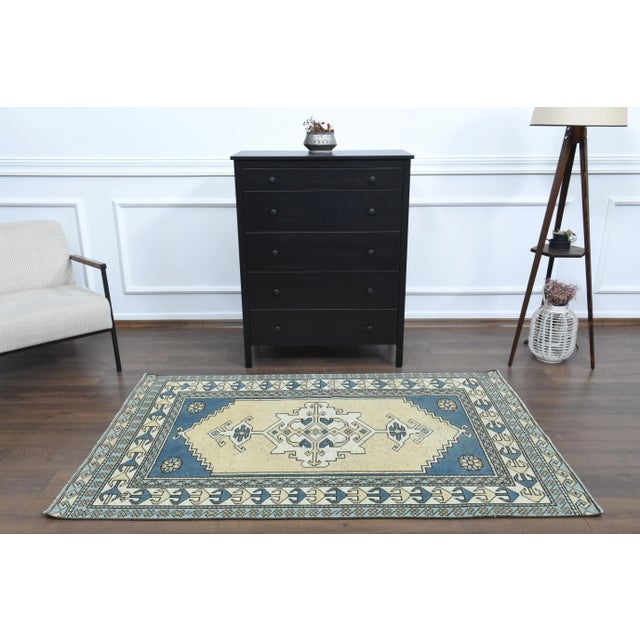 Vintage Turkish Hand-Knotted vintage rug is a semi-antique vintage area rug.'70s Eastern region of Turkey's unique rug is...