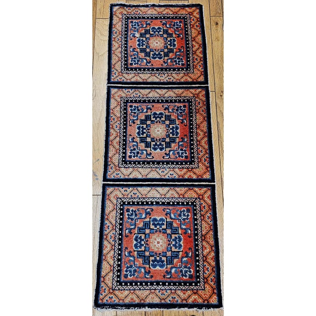 A rare and spiritually resonant vintage Tibetan temple runner from the fourth quarter of the 19th century — a textile...