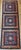 A rare and spiritually resonant vintage Tibetan temple runner from the fourth quarter of the 19th century — a textile...