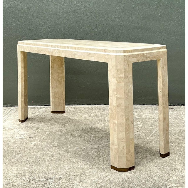This sophisticated vintage console table is a masterclass in Post-Modern elegance, featuring a meticulous tessellated...