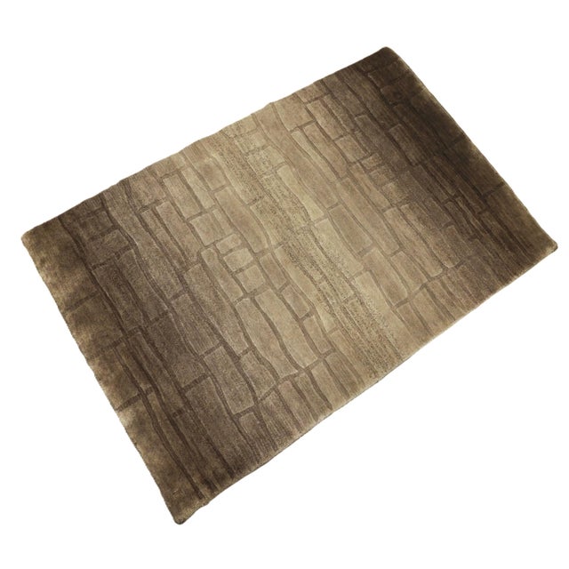 Hand knotted rug in high and low displaying brick pattern. Wool pile on Cotton foundation. 2'1"x 3'2".