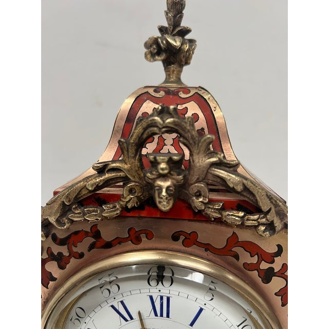 Napoleon iii boulle-style marquetry mantel clock brass marquetry and red material on three sides beautifully chased bronze...