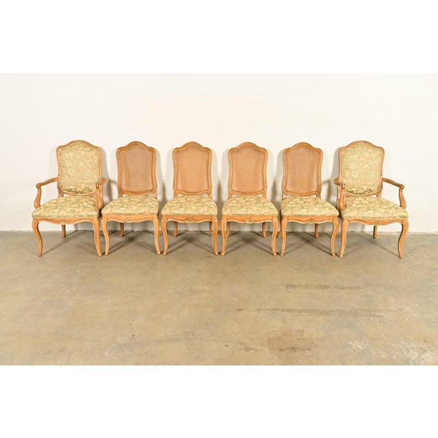 A gorgeous set of six French Provincial Louis XV style dining chairs By John Stuart USA, Circa 1960s Carved oak, with...