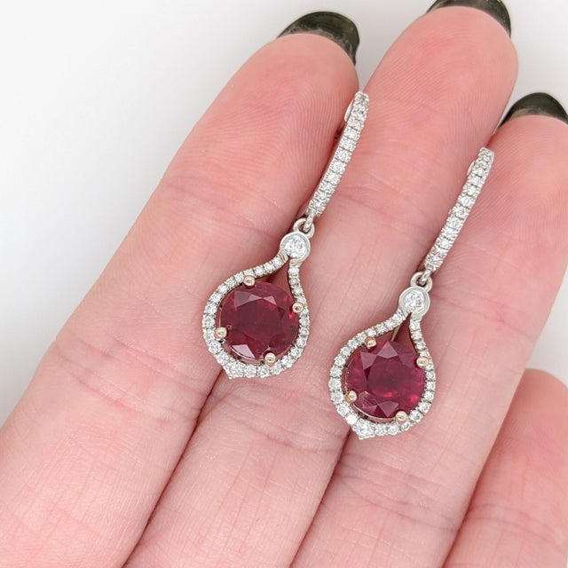 Rich Madagascar rubies paired with natural diamond accents create a bold yet timeless glow in solid 14K gold. These 5.8Ct...