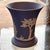 Classic and highly collectible vintage jasperware vase by Wedgwood, made in England. This elegant piece features the...