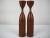 Pair of Mid-century Indonesian carved teak candle holders. Sleek Mid-century design featuring hand-carved floral...
